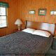 Country bedroom in Cabin 10, (Mountain Haven), in Pigeon Forge, Tennessee.