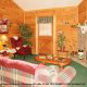 Rest in this great room and put your feet up in cabin 102 (Barbaras View), in Pigeon Forge, Tennessee. 