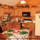Beautifully decorated fully furnished kitchen in cabin 102 (Barbaras View), in Pigeon Forge, Tennessee. 