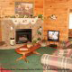 Enjoy the fire place in this living room  in cabin 102 (Barbaras View), in Pigeon Forge, Tennessee. 