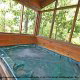 Let all your aches melt away in this soothing hot tub in cabin 103 (Knotty Pine), in Pigeon Forge, Tennessee. 