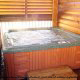Hot Tub on Deck in Cabin 11 (Sweet Serenity) at Eagles Ridge Resort at Pigeon Forge, Tennessee.