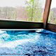 Hot Tub on Deck in Cabin 13 (Amidst The Beauty) at Eagles Ridge Resort at Pigeon Forge, Tennessee.