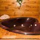 Heart Shaped Jacuzzi View of Cabin 17 (Perfect Getaway) at Eagles Ridge Resort at Pigeon Forge, Tennessee.