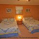 Country Bedroom for two in Cabin 19 (Fryemont Manor) at Eagles Ridge Resort at Pigeon Forge, Tennessee.