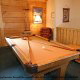 Game Room with Pool Table in Cabin 202 (Now And Forever) at Eagles Ridge Resort at Pigeon Forge, Tennessee.