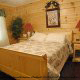 Country bedroom in cabin 204 (Browns General Store), in Pigeon Forge, Tennessee. 