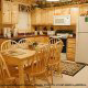Fully furnished kitchen in cabin 204 (Browns General Store), in Pigeon Forge, Tennessee.