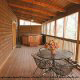 Deck with hot tub in cabin 207 (Count Your Blessings) at Eagles Ridge Resort at Pigeon Forge, Tennessee.