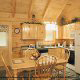 Fully furnish country kitchen in cabin 209 (Montgomery\'s Hideaway), in Pigeon Forge, Tennessee. 