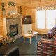Country living room in cabin 209 (Montgomery\'s Hideaway), in Pigeon Forge, Tennessee. 