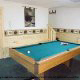 Game room with pool table in cabin 209 (Montgomery\'s Hideaway), in Pigeon Forge, Tennessee. 