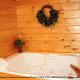 Bathroom View with Jacuzzi of Cabin 210 (Eagles Hideaway) at Eagles Ridge Resort at Pigeon Forge, Tennessee.