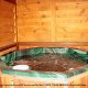 Hot Tub on Deck in Cabin 212 (Codys Comfort) at Eagles Ridge Resort at Pigeon Forge, Tennessee.