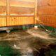Hot Tub on Deck in Cabin 214 (A Birds Nest) at Eagles Ridge Resort at Pigeon Forge, Tennessee.
