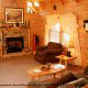 Relax in this country living room in cabin 216 (Bearly County), in Pigeon Forge, Tennessee.