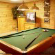 Game room with pool table in cabin 216 (Bearly County), in Pigeon Forge, Tennessee.