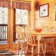 Dining room with a view in cabin 220 (Mountain Hideaway), in Pigeon Forge, Tennessee. 
