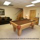 Game room with pool table in cabin 222 (Robins Nest), in Pigeon Forge, Tennessee. 