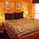 Country Bedroom View of Cabin 224 (Southern Comfort) at Eagles Ridge Resort at Pigeon Forge, Tennessee.