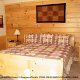 Country bedroom in cabin 226 (Ledfords Lodge), in Pigeon Forge, Tennessee.