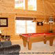 Game room with pool table in cabin 226 (Ledfords Lodge), in Pigeon Forge, Tennessee.