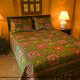 Bedroom with Queen Size Bed in Cabin 23 (Smoky Memories) at Eagles Ridge Resort at Pigeon Forge, Tennessee.
