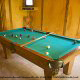 Game Room with Pool Table in Cabin 23 (Smoky Memories) at Eagles Ridge Resort at Pigeon Forge, Tennessee.