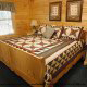 Country Bedroom View of Cabin 230 (Smoky Mountain Paradise) at Eagles Ridge Resort at Pigeon Forge, Tennessee.