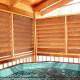 Deck with large hot tub in cabin 234 (Dancing Bear Lodge) at Eagles Ridge Resort at Pigeon Forge, Tennessee.