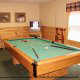 Game room with pool table in cabin 234 (Dancing Bear Lodge) at Eagles Ridge Resort at Pigeon Forge, Tennessee.