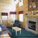 Large living room with fire place in cabin 235 (Romantic Retreat , in Pigeon Forge, Tennessee. 