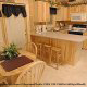 Fully furnished kitchen in cabin 240 (Smoky Safari ) , in Pigeon Forge, Tennessee.