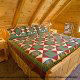 One of 7 country bedrooms in cabin 241 (Eagle Crest Lodge) at Eagles Ridge Resort at Pigeon Forge, Tennessee.