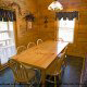 Large country dining room in cabin 241 (Eagle Crest Lodge) at Eagles Ridge Resort at Pigeon Forge, Tennessee.