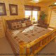 Country bedroom in cabin 244 (Blackhawk Hideaway) , in Pigeon Forge, Tennessee.