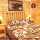 Country Bedroom View of Cabin 245 (Almost Heaven) at Eagles Ridge Resort at Pigeon Forge, Tennessee.