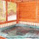 Hot tub on back porch in cabin 246 (The Getaway) , in Pigeon Forge, Tennessee.