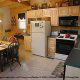 Fully furnished country kitchen in cabin 247 (Legacy Lodge ) , in Pigeon Forge, Tennessee.