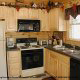 Fully furnished kitchen in cabin 248 (Scenic Hideaway ) , in Pigeon Forge, Tennessee.