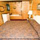Country bedroom in cabin 25 (Country Daze) , in Pigeon Forge, Tennessee.