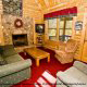 Living room with fireplace in cabin 25 (Country Daze) , in Pigeon Forge, Tennessee.