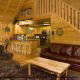 Great room with fireplace in cabin 252 (Coal Miners Daughter) at Eagles Ridge Resort at Pigeon Forge, Tennessee.