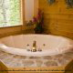 Private jacuzzi in cabin 252 (Coal Miners Daughter) at Eagles Ridge Resort at Pigeon Forge, Tennessee.