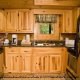 Country fully furnished kitchen in cabin 252 (Coal Miners Daughter) at Eagles Ridge Resort at Pigeon Forge, Tennessee.