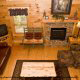 Overhead den with fireplace in cabin 252 (Coal Miners Daughter) at Eagles Ridge Resort at Pigeon Forge, Tennessee.