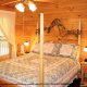 Country bedroom in cabin 253 (Mt Richmond) at Eagles Ridge Resort at Pigeon Forge, Tennessee.