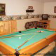 Game room with pool table in cabin 253 (Mt Richmond) at Eagles Ridge Resort at Pigeon Forge, Tennessee.