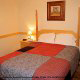 Country bedroom in cabin 255 (Happy Trails) at Eagles Ridge Resort at Pigeon Forge, Tennessee.