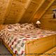 Bedroom View of Cabin 257 (Mountain Charm) at Eagles Ridge Resort at Pigeon Forge, Tennessee.